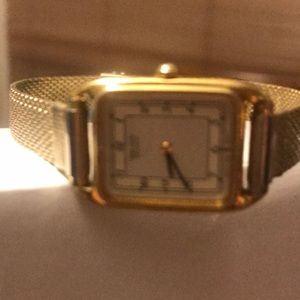 Gold banded watch